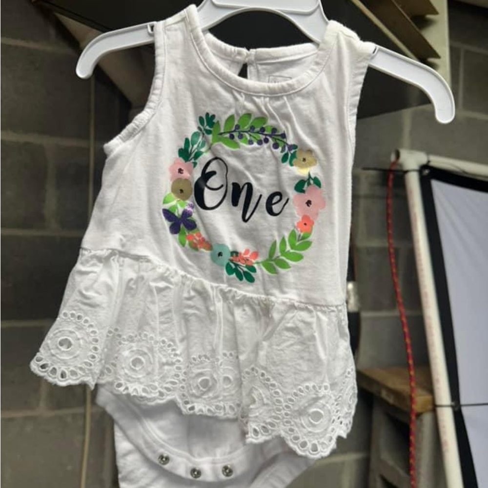 Carter’s first birthday onesie